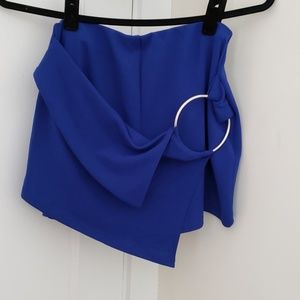Royal blue shorts.